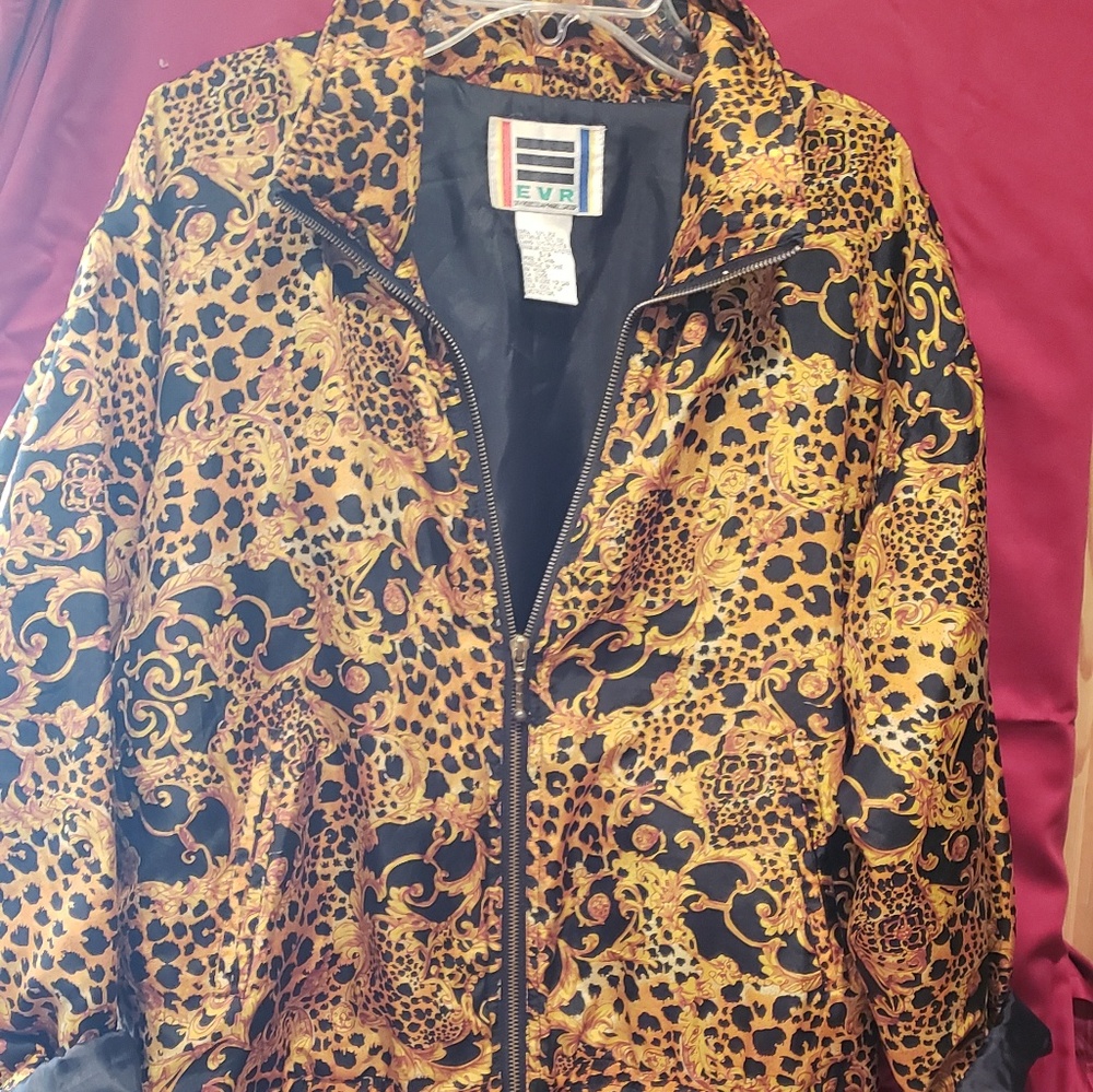 A timeless Beautiful  silk, zipper up front Jacket